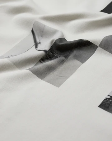 Muse-tee Kremfarget