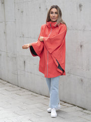 The womans poncho Coral