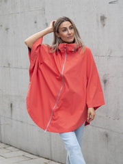 The womans poncho Coral